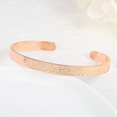 Treat yourself or surprise a loved one with this meaningful and elegant cuff, embrace the countless blessings of this potent verse, making it your most meaningful accessory yet. Let this cuff serve as a constant reminder to hold Ayatul Kursi close to your heart. Spiritual Friendship Cuff Bangle Bracelet, Spiritual Friendship Cuff Bracelet, Spiritual Bangle Cuff Bracelet Gift, Spiritual Cuff Bracelet Bangle Gift, Engraved Rose Gold Bangle Cuff Bracelet, Engraved Rose Gold Cuff Bangle Bracelet, Engraved Rose Gold Cuff Bangle, Spiritual Rose Gold Bangle Bracelets, Rose Gold Promise Bangle Bracelet