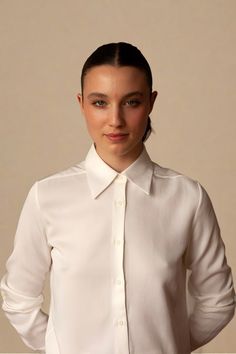 100% LyocellCorozo Buttons Point collar, button down blouse, side slit, back tail, pleated cuff with button closure.White Made in New YorkAlyssa wears size XSFeatured with Paco Pant Button Down Blouse, Button Downs, Button Up, Cuff, Collar, Pants, How To Wear, White, Quick Saves