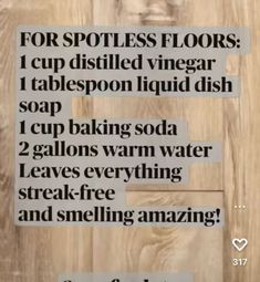 a sign that reads for spotless floors i cup distilled vinegar, 1 tablespoo liquid dish soap