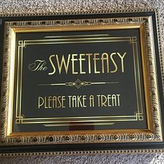 a sign that says the sweetesty please take a treat in gold and black