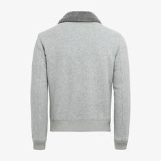 This light grey bomber jacket is tailored to a comfortable regular fit with a hip length and features double end opening zip closure, detachable shearling collar, flapped patch pockets, and ribbed hem and cuffs for a tapered finish. Gray Outerwear With Ribbed Cuffs For Cold Weather, Gray Winter Outerwear With Ribbed Cuffs, Modern Winter Outerwear With Ribbed Cuffs, Gray Wool Outerwear With Ribbed Cuffs, Gray Workwear Outerwear With Ribbed Cuffs, Gray Outerwear With Ribbed Cuffs For Work, Gray Ribbed Cuffs Outerwear For Work, Gray Long Sleeve Outerwear With Ribbed Collar, Brown Overcoat