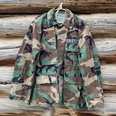 "Rad retro vintage camouflage U.S. Army Jacket. Fits men small/medium and women medium, see measurements: 22\" pit to pit, 28\" length, 24\" sleeve. Four pockets on frontside, great thick wicking material and great as a layer. Durable cotton ripstop material. #camo #armyjacket" Camouflage Long Sleeve Utility Jacket For Hunting, Casual Camouflage Outerwear For Hunting, Camouflage Utility Jacket With Pockets For Streetwear, Vintage Camouflage Hunting Outerwear, Camouflage Utility Jacket For Hunting In Fall, Military Camouflage Utility Jacket With Pockets, Combat Cotton Camouflage Outerwear, Military Style Camouflage Utility Jacket With Pockets, Vintage Camouflage Outerwear For Hunting