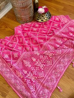 A very very pretty Chikankari saree in pure georgette in a lovely candy pink shade with all over jaal (barfi pattern) embroidery with mukaish work (embellishments). The pallu is short but features intricate designs. The entire saree has the same pattern from the very beginning of the saree except the portion you have to tuck in so that it doesn't bulge. Entire saree is framed in cord piping, best quality satin falls are attached and picot stitching is done as well. The blouse piece is separated Pink Dupatta With Intricate Embroidery, Pink Dupatta With Intricate Embroidery In Traditional Drape, Pink Semi-stitched Saree With Intricate Embroidery, Pink Saree With Intricate Embroidery, Pink Embroidered Saree, Traditional Pink Saree With Intricate Embroidery, Traditional Pink Saree With Resham Embroidery, Pink Cutdana Dupatta For Traditional Ceremonies, Pink Dupatta With Intricate Embroidery For Diwali