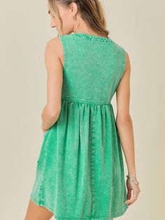 If you can dream it, you can do it in this vibrant washed green denim dress! With a flattering v-neck, sleeveless design, and full button front, this dress is perfect for any adventure. The front pockets add convenience while the mini length adds a touch of playfulness. Color: Washed Green Fabric: 85% Cotton, 15% Polyester Includes: x1 Dress Sizes: S-M-L, Regular Sizing. True to Size. Green Cotton Sleeveless Casual Dress, Casual Green Cotton Sleeveless Dress, Spring Washed Sleeveless Denim Dress, Casual Sleeveless Washed Dresses, Sleeveless V-neck Dress With Button Closure For Spring, Washed Cotton Sleeveless Mini Dress, Sleeveless Washed Cotton Mini Dress, Sleeveless Washed Cotton Dress, Casual V-neck Sleeveless Dress With Button Closure