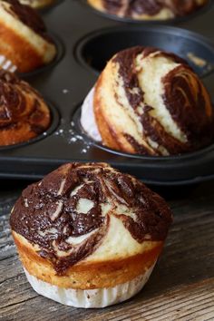 chocolate swirl cupcakes in a muffin tin