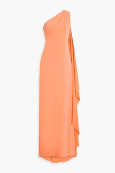 an orange dress with one shoulder and ruffles on the bottom, in front of a white background