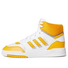 Adidas Retro Skate Shoes For Sports, Adidas Retro Skate Shoes, Adidas Retro Skate Shoes For Skateboarding, Retro Adidas Skate Shoes For Skateboarding, Retro Adidas Skateboarding Shoes, Retro Adidas Skate Shoes With Logo, Retro Skate Shoes With Three Stripes For Sports, Retro Yellow Skate Shoes For Sports, Retro Yellow High-top Sneakers For Streetwear