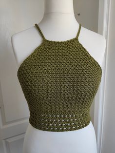 a crocheted top on a mannequin