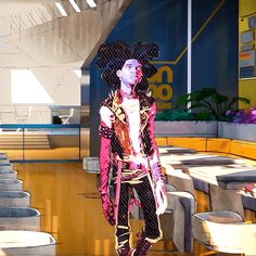 a man dressed in an elaborately designed outfit standing next to a table and chairs