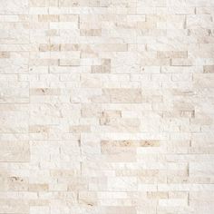 a wall made out of white marble bricks with no mortars or mortars on it