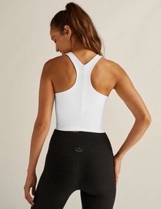 The Beyond Yoga bestselling Focus tank, reimagined and redesigned for an even more incredibly flattering fit on all shapes. Flow right from the mat to meeting up with friends in this sleek, studio-style cropped active tank with built-in bra. We made it just the right length to pair over your favorite high waisted leggings for the ultimate workout-to-out and about outfit. High scooped neckline Self shelf bra Slim racerback detail Cropped length Uniquely created to flatter every shape Every style we produce is wear-tested on our in-house team to ensure the best fit in every size The Beyond Yoga buttery soft performance fabric with a unique texture and exceptionally soft hand. Ultra Soft Feel 4-way Stretch To Move With You Moisture Wicking To Keep Dry Easy Care - Wash + Dry Enjoy The Sun With Hot Yoga Outfit, Yoga Pants Men, Athleisure Men, Athleisure Women, Yoga Shop, We Made It, Beyond Yoga, Organic Clothing, Yoga For Men