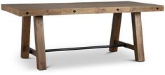 a wooden table with two black handles on each side and one leg up against it