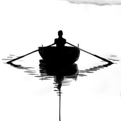 a person rowing a boat in the water