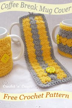 a crocheted coffee mug cozy with yellow and gray stripes on the side, next to two cups