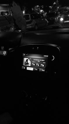 the dashboard of a car at night time