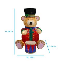 a teddy bear wearing a top hat and holding a drum