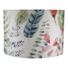 a lamp shade with watercolor leaves on it