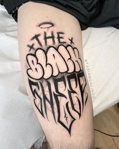 a man's leg with graffiti writing on it and the words, the bad fit