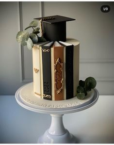 there is a cake with books on it