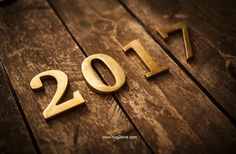 a wooden table with the numbers 2017 spelled out