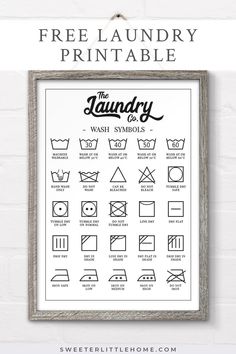 laundry symbols printable poster hanging on a wall