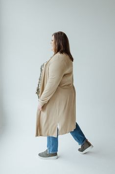 Featuring a warm almond color, this Long Sleeve Cardigan with Back Ruching is crafted from luxurious midweight fabric that offers ultimate comfort and breathability. The relaxed fit, banded sleeve and back ruching provide a flattering look and quality feel. The knee-length duster silhouette means it will pair well with leggings for a dressed down style, or with work pants for modern sophistication. Wash Hand wash in cold water. Do not wring. Lay flat or hang to dry. Fabric 94% Viscose 6% Elastan Knee Length Cardigan, Almond Color, Sleeve Cardigan, Work Pants, Long Sleeve Cardigan, Dressed Down, Lay Flat, Cold Water, Knee Length