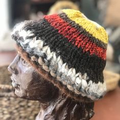 "I did something new... I had many small balls of yarn that I've collected from many projects, and I thought...🤔 Why not make a hat with these hand spun yarns!?... So I did! I'll call this \"The Rag Hat\". I hand knitted the hat: Llama, Alpaca, Mohair, wool and camel. Also, you'll see a little sparkly in the deep brown. That's \"Angelina\". Most of these fibers were processed  at our Oklahoma Mini Mill, which means that most of them were locally raised. The hat weighs 4 ounces and is definitely a one-of-a-kind!🤗" Bohemian Hand Knitted Crochet Hat, Hand Knitted One Size Brimmed Bonnet, Hand Knitted One Size Alpaca Hats, Hand Knitted Brown Bonnet One Size, Hand-knitted Brimmed Bonnet, Bohemian Knitted Yarn Hats, One Size Hand Knitted Brimmed Bonnet, Handmade Wool Brown Hats, Bohemian Hand Knitted Yarn Bonnet