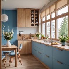 a kitchen filled with lots of wooden furniture next to a window covered in blue curtains