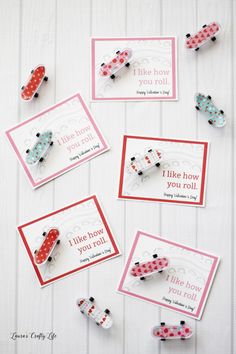 four different types of pins with words on them and some type of polka dot design