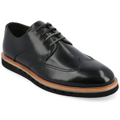 Introducing the Evander derby shoe from Vance Co., a seamless fusion of style and comfort with its 1-inch heel, lace-up closure, and classic round toe design. Crafted from faux leather this style offers a fashionable choice for various occasions. The mesh lining, 6 mm Tru Comfort Foam™ footbed, and rubber outer sole ensure breathability, comfort, and support, making the Evander a versatile and conscious addition to your footwear collection. Classic Black Oxfords With Laces, Black Lace-up Dress Shoes For Derby, Black Lace-up Shoes For Derby, Wingtip Oxfords With Laces For Derby, Wingtip Lace-up Shoes With Textured Sole For Derby, Wingtip Dress Shoes With Laces For Work, Low-top Laced Oxfords For Business, Black Lace-up Oxfords For Derby, Low-top Oxfords With Laces For Business