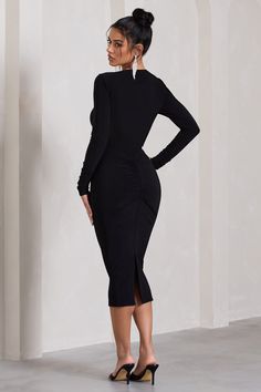 Arriving in a classic black shade of our signature stretch jersey. Noelle is a flattering fit for any occasion. This striking black midi dress features a twisted neckline. chest cut-out and functional split hemline. For a timeless cocktail party ensemble. try styling Disconnect with some diamanté earrings and black mules. Features - Premium stretch jersey - Bodycon fit - Twisted neckline - Chest cut-out- Long sleeves- Split hemline - Midi length Sizing & Fit Model is 5'8" and wears UK size 8 / US size 4 Product Information Designed exclusively by Club L London Double layered with good stretch Premium jersey in Black (95% Polyester. 5% Elastane) 120cm total length SKU: CL131065002 Velvet Prom Dress, Club L London, Black Mules, Black Tie Gala, Glamorous Dresses, Sequin Maxi Dress, Black Shade, Black Midi, Women Midi