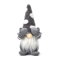 a stuffed toy gnome with white and gray hair