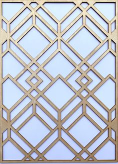 an intricate wooden panel with geometric designs on it