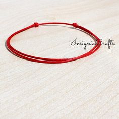 Red String Bracelet Red String of Fate Unisex Bracelet Mens Bracelet Red Cord Bracelet Protection Bracelet, Vegan, Mens friendship bracelet These lovely bracelet is made with waxed cord. Easily adjustable by moving the knots closer or away. It opens from 6'' to 12 '' inches. This bracelet will be sent in a gift pouch. Please feel free to contact me if you have any questions. For more Simple Anklets/Bracelets https://www.etsy.com/uk/shop/InsigniaCrafts?ref=seller-platform-mcnav&section_id=24106049 Thank you for visiting. InsigniaCrafts © 2018 InsigniaCrafts. All Rights Reserved. Red Adjustable Cord Friendship Jewelry, Red Adjustable Friendship Jewelry, Red Adjustable Cord Jewelry For Friendship, Red Minimalist Bracelets With Adjustable Cord, Minimalist Red Bracelets With Adjustable Cord, Minimalist Red Bracelet With Adjustable Cord, Casual Red Jewelry With Adjustable Cord, Red Casual Wristband As Gift, Casual Red Wristband For Gift