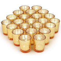 a bunch of glasses that are sitting in the shape of a circle on a white surface