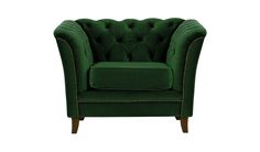 a green velvet chair with studded trimmings on the arms and back, viewed from the front