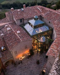 an aerial view of a building with a glass roof