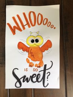 a sign that says whoooo is so sweet? with an owl drawn on it