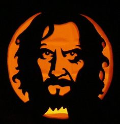 a pumpkin carved to look like the face of jesus