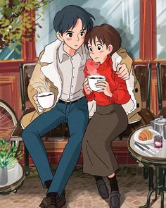 a man and woman sitting on a bench with coffee in their hands while holding each other