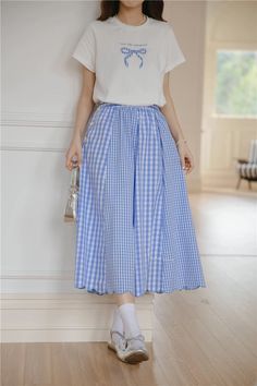 Double gingham plaid skirt with a button-up closure and scalloped hem. S: 24" waist, 30.5" lengthM: 25.5" waist, 31" lengthL: 27" waist, 31.5" length Gingham Skirt Outfit, Gingham Skirt, Maxi Skirt Outfits, Skirt Outfit, Plaid Skirt, Blue Gingham, Overall Dress, Scalloped Hem, Plaid Skirts