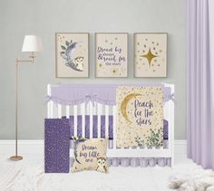 a baby's room with purple and gold decor