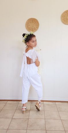 "Flower Girl Dress , Flower Girl Romper, Toddler White Romper, Flower Girl Jumpsuit, Flower Girl Boho, Wedding , Wedding party , White Dress Cute, Simple Jumpsuit, romper,. Perfect for Flower Girls, photoshoot, or special events. Beach Wedding, garden wedding, boho wedding. Made with 100% cotton and soft tulle. Model is wearing white , but I offer white, off white / Ivory color. our off white is the closest match to Ivory color wedding gown. Care : Handwash, machine was cold. Hang dry or lay fla Company Outfit, Party White Dress, Simple Jumpsuit, Wedding Pants, Flower Girl Outfit, Rehearsal Dinner Outfits, Reception Outfit, Cute White Dress