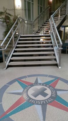 the stairs leading up to the hospital are decorated with stars and letters that read,