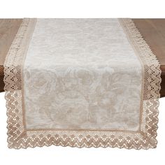 a table runner with lace trim on it