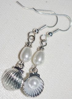 Handmade Earrings: Silver Scallop Shells with Pearls Silver Shell-shaped Pearl Earrings For Gifts, Silver Shell-shaped Earrings With Pearl Drop, Handmade Silver Shell-shaped Pearl Earrings, Wrapping Crystals, Wire Wrapping Crystals, Scallop Shells, Jewelry Inspo, Ear Jewelry, Ear Wire