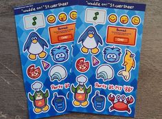 two blue stickers with different cartoon characters on them