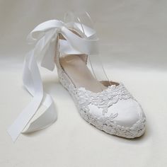 Bridal Spanish espadrilles handmade with love for you. Very comfortable,and glamorours. You can choose the model with bracelet, or with ribbon. Both are very beautiful, and elegant. Color: off white. Wedges: 5cm, Platform:2cm Elegant Cream Espadrilles For Beach, Elegant Cream Espadrilles For The Beach, Elegant White Espadrilles For Spring, Elegant Cream Espadrilles For Summer, Elegant White Espadrilles For Beach, Elegant Closed Toe Espadrilles For Beach, Elegant Flat Espadrilles, White Lace-up Summer Wedding Shoes, White Lace-up Wedding Shoes For Summer