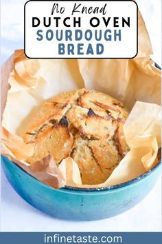 no knead dutch oven sourdough bread in a blue bowl