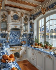 an ornate kitchen with blue and white decor